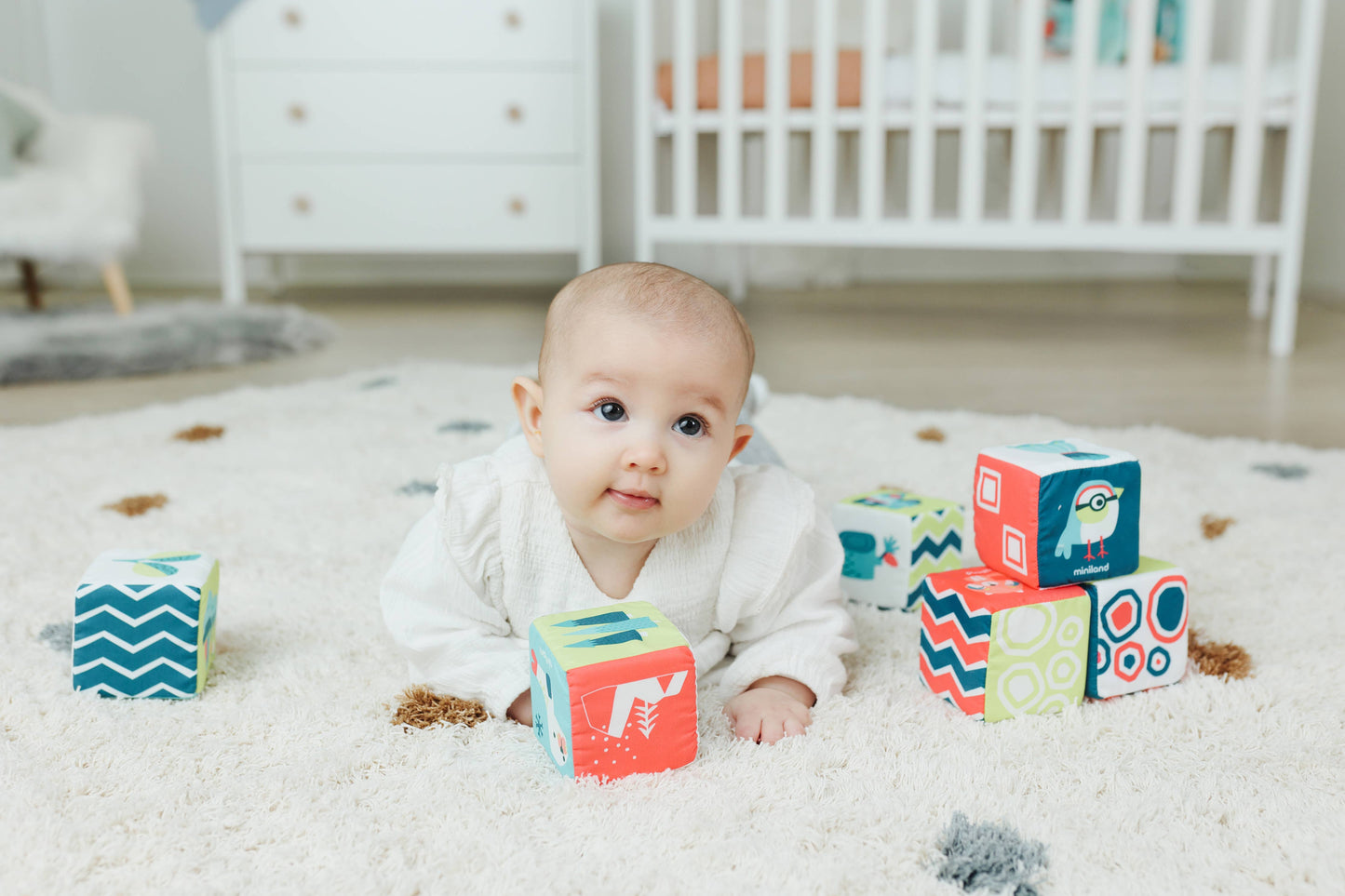 Feel to Learn: Soft rattle cubes set